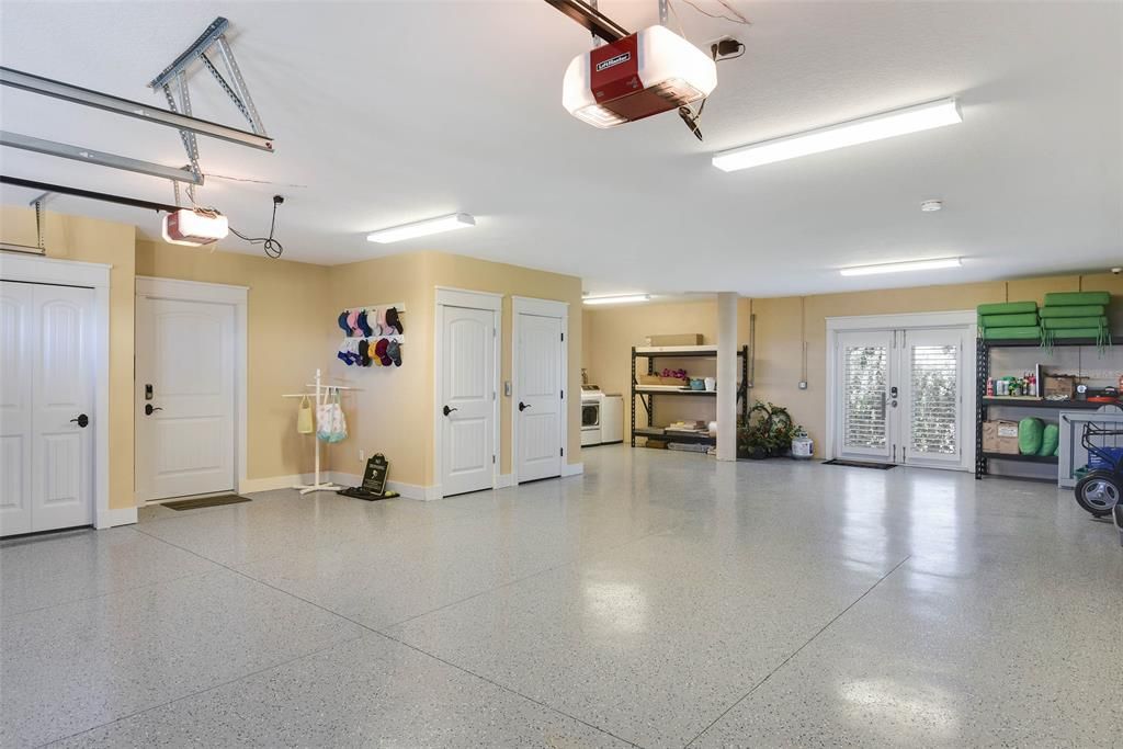 HUGE Garage w/ 2nd full laundry area and direct access to Foyer and Elevator