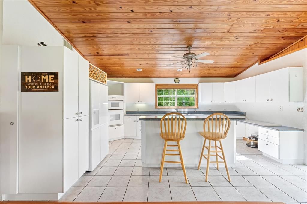 Custom Crafted Kitchen with Island for entertaining and PLENTY of storage!