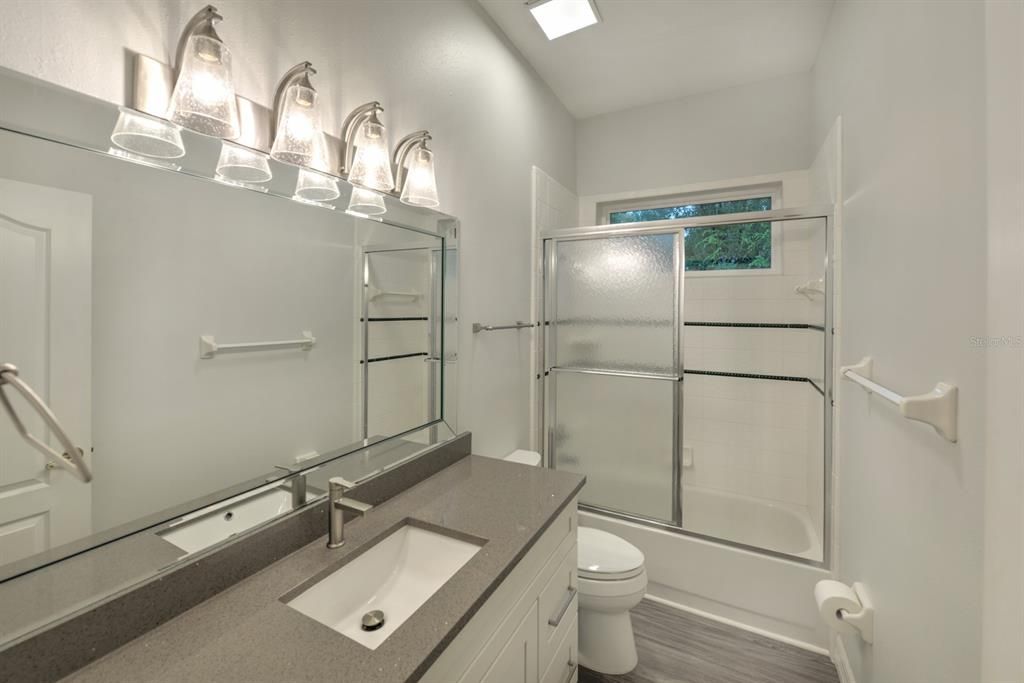 Guest bath with Quartz countertop.