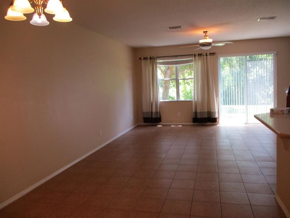 DINING/LIVING ROOM AREAS, TILE FLOORING.
