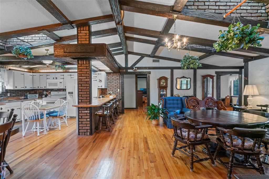 Family room that opens up into the kitchen area. Feels like being in a chalet or resort.