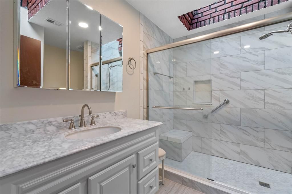 Remodeled Master Bathroom with skylights.