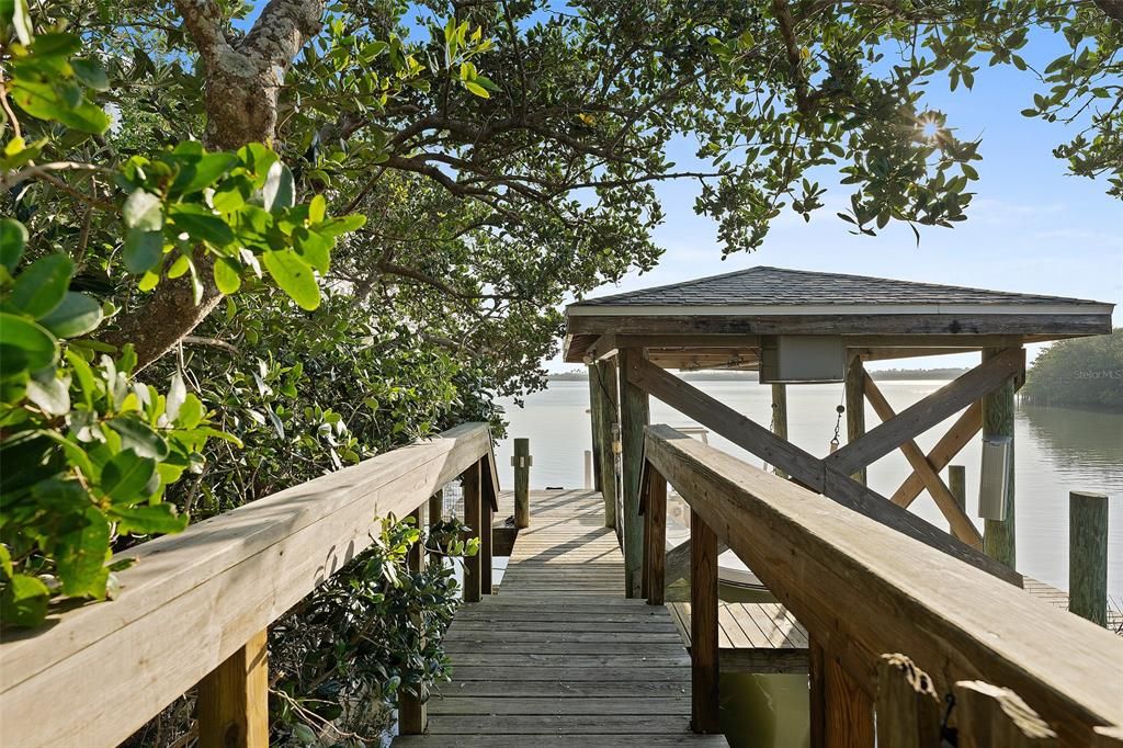 LUSH SECRET PATH TO THE COVERED PRIVATE BOATDOCK!