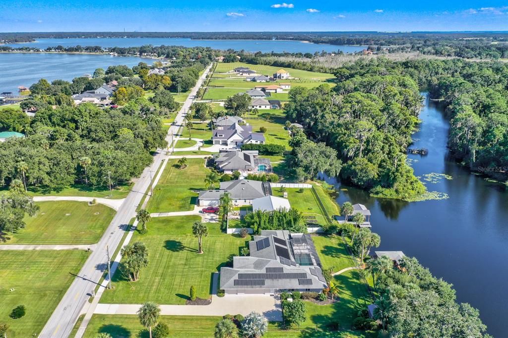 Lake Beauclair into Lake Dora into Lake Eustis into Lake Griffin into the Ocklawaha River through the Ocala National Forest into St Johns River leading to Jacksonville.