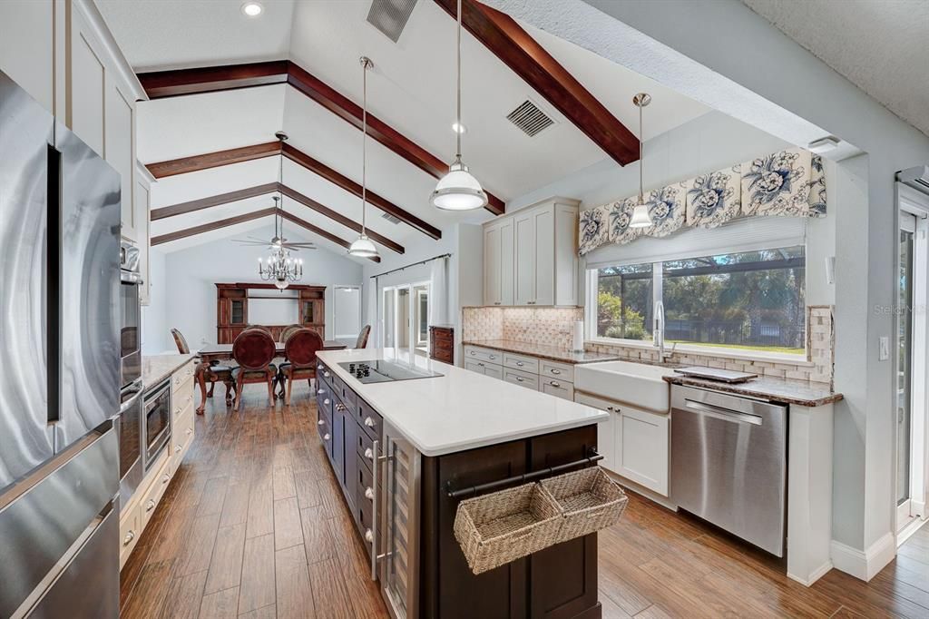 Looking from eat in kitchen area and walk in pantry towards the great room.