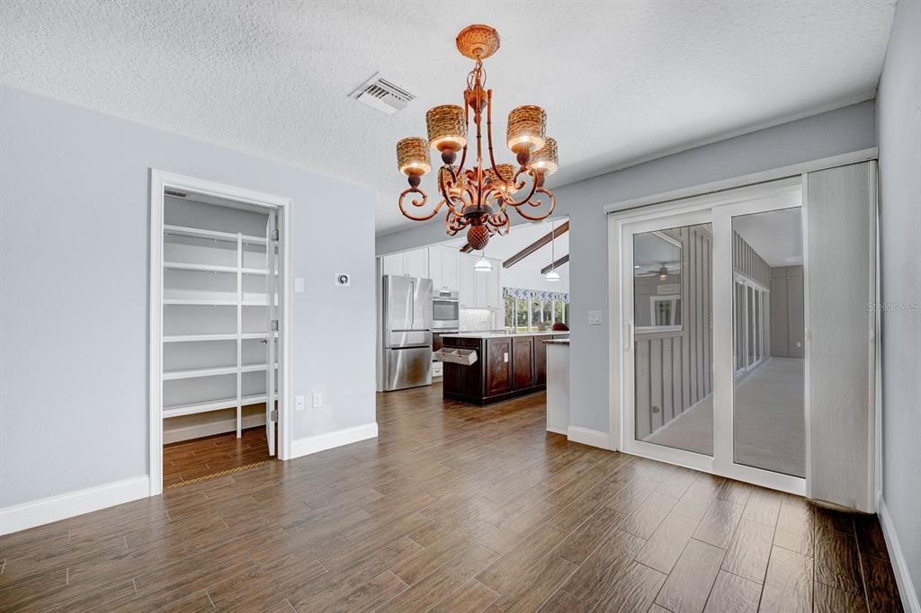 To the left walk in pantry. Insulated sliders w/blackout shades. Walk in Pantry 8'0 X 5'0Breakfast nook is 12'1 X 10'10