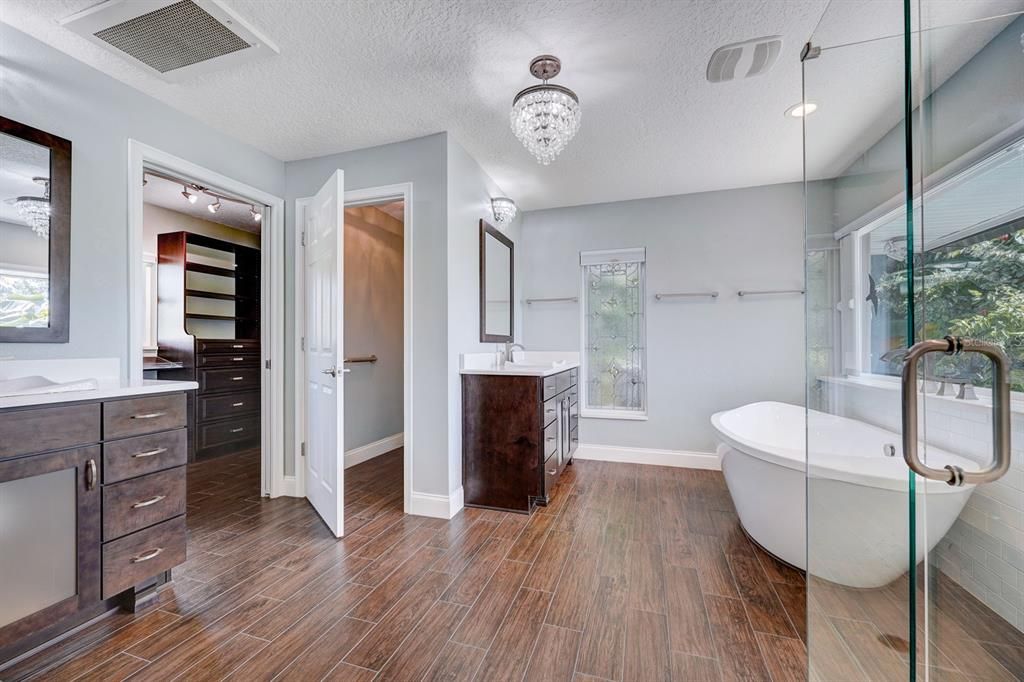 Master bath 12'1 X 12'10 Customized closet #2 walk-in  His and Her sinks w/vanities.