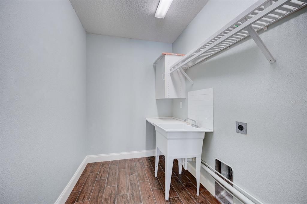 Laundry room off breakfast nook.  Laundry room 9'2 X 5'9