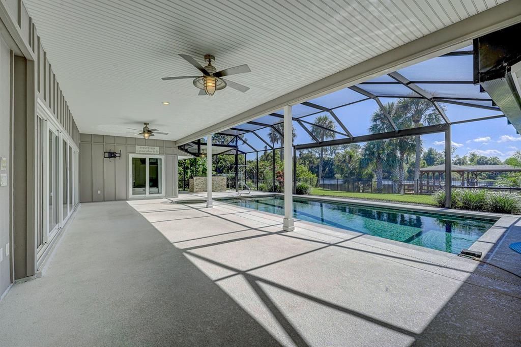 Large oversized deck area great for entertaining. Looking towards the dock and waterway.