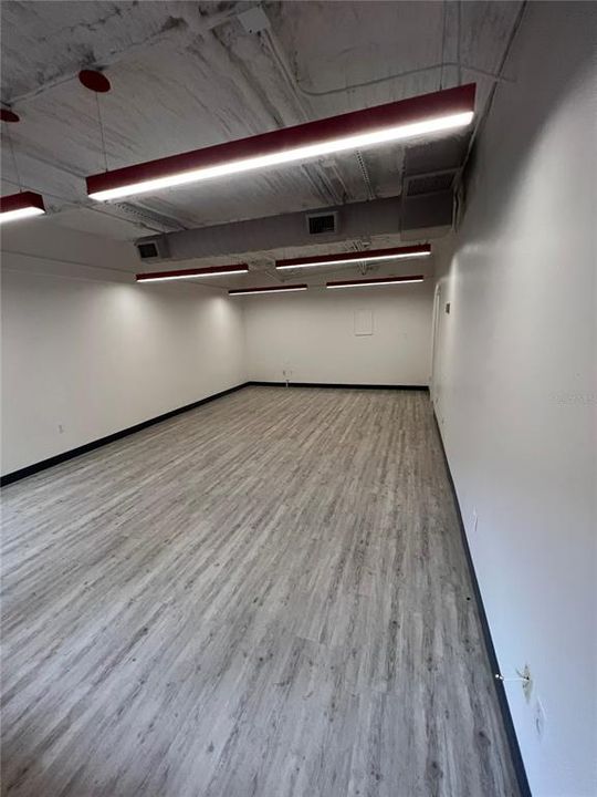 Interior has fresh paint, new vinyl floors and lighting
