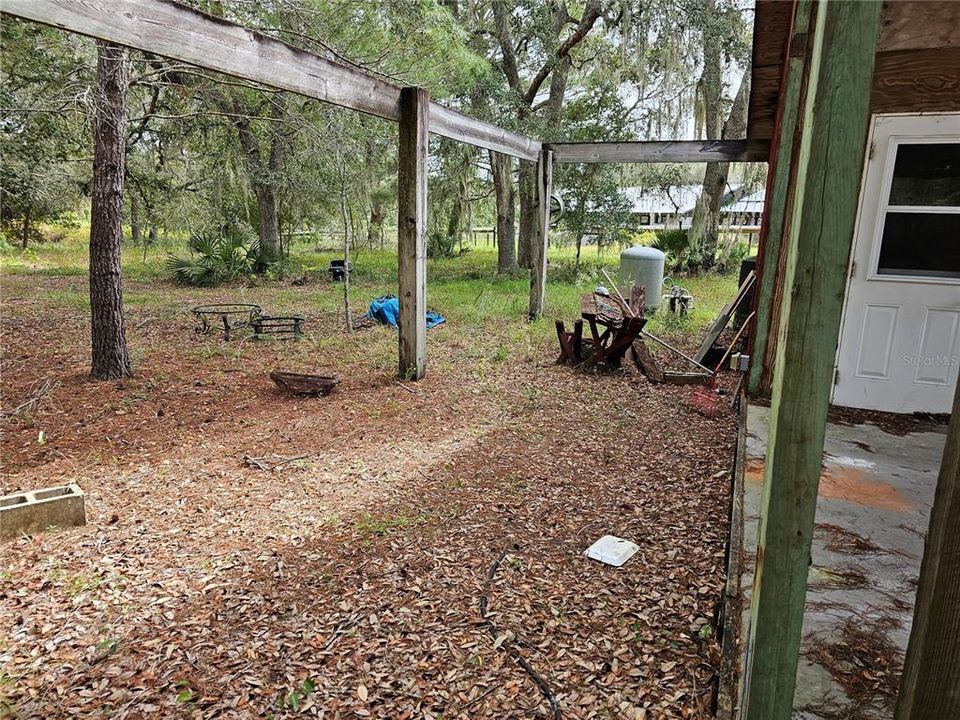 Open area towards rear of garage