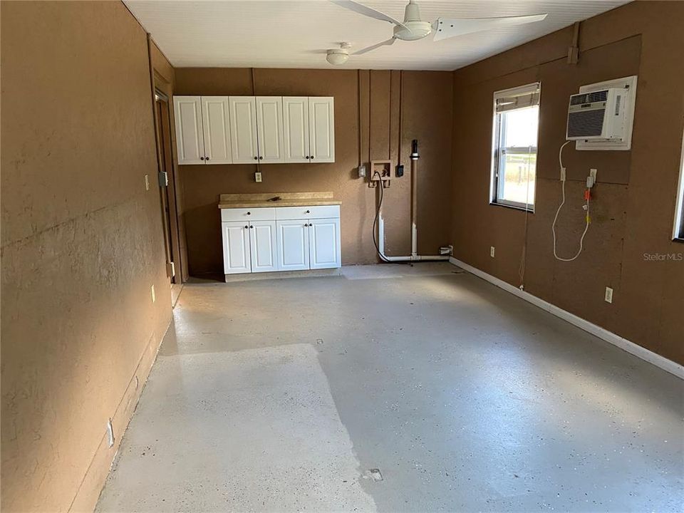 A/C storage room with washer dryer hook up