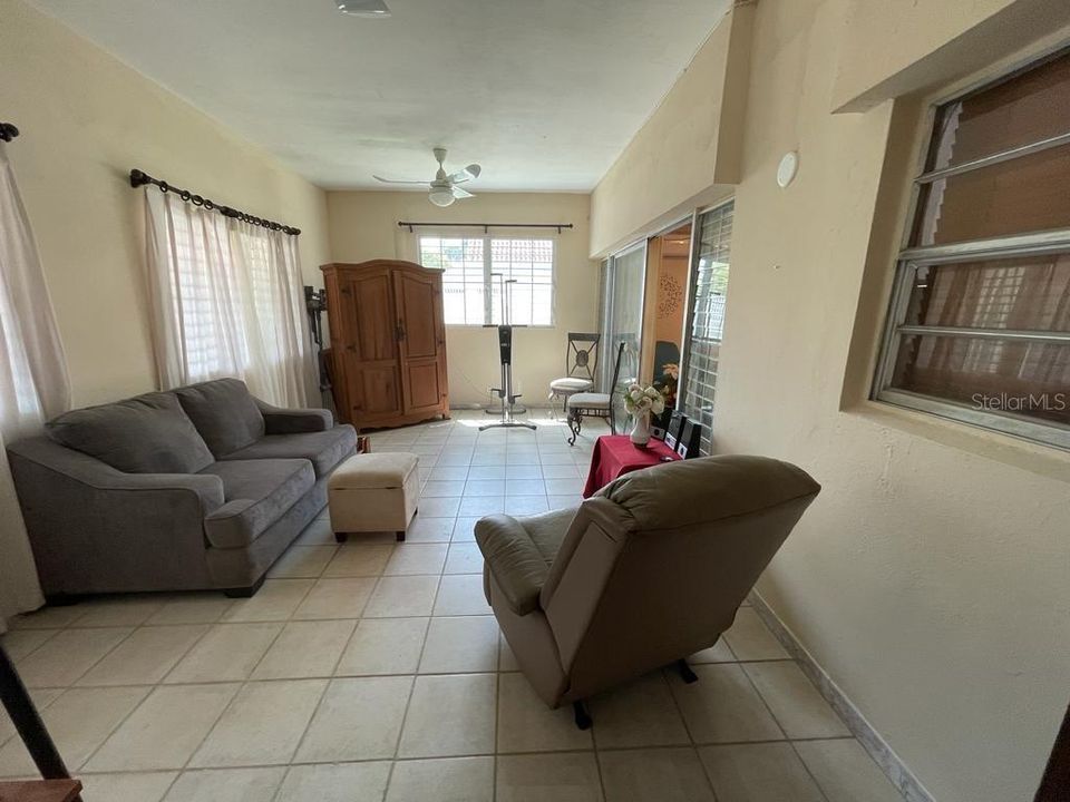 Bedroom used as a family room, but with potential to be a bedroom with full bathroom