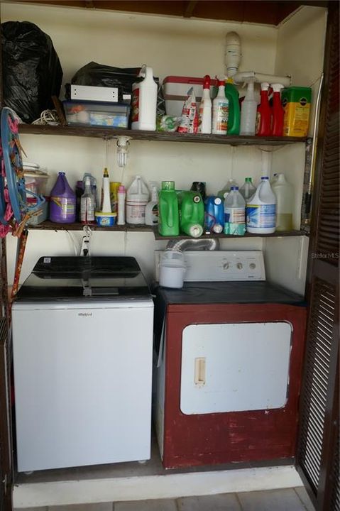 Utility closet located at one of the covered patios