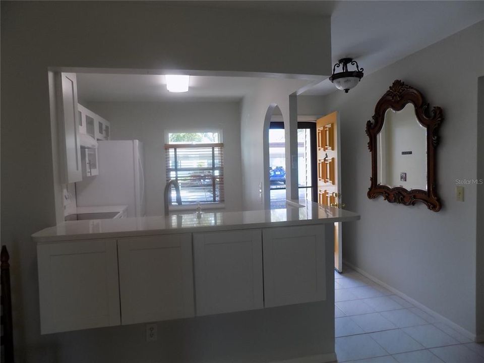 Lovely Remodeled kitchen & Quartz countertops.