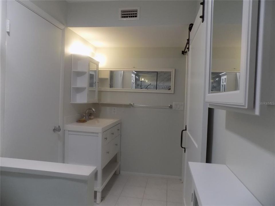 Bathroom looking toward vanity.