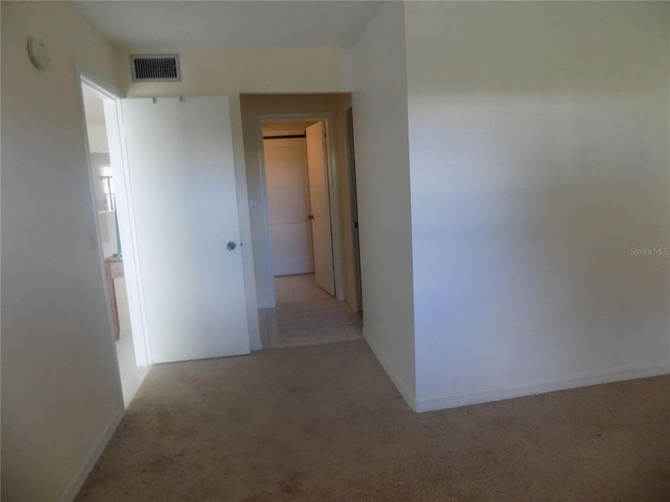 Master Bedroom looking toward Walk-in closet and Bathroom.