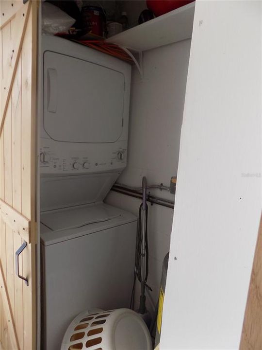 Laundry Closet & water heater area in Enclosed Sunroom Porch.