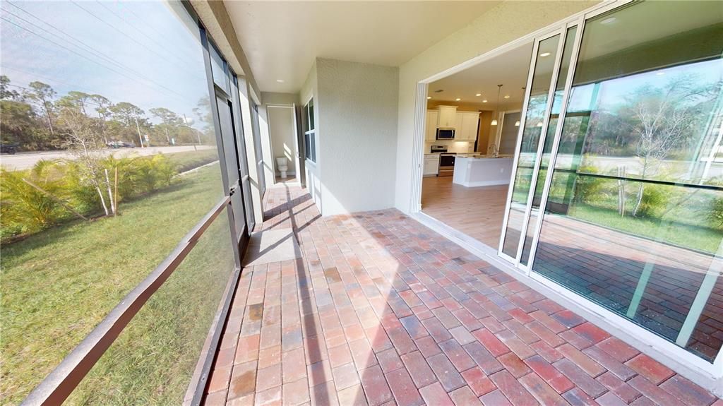 Screened rear lanai with bath access