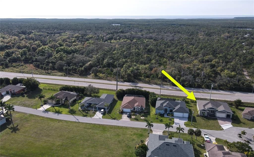 Aerial front view of home and location