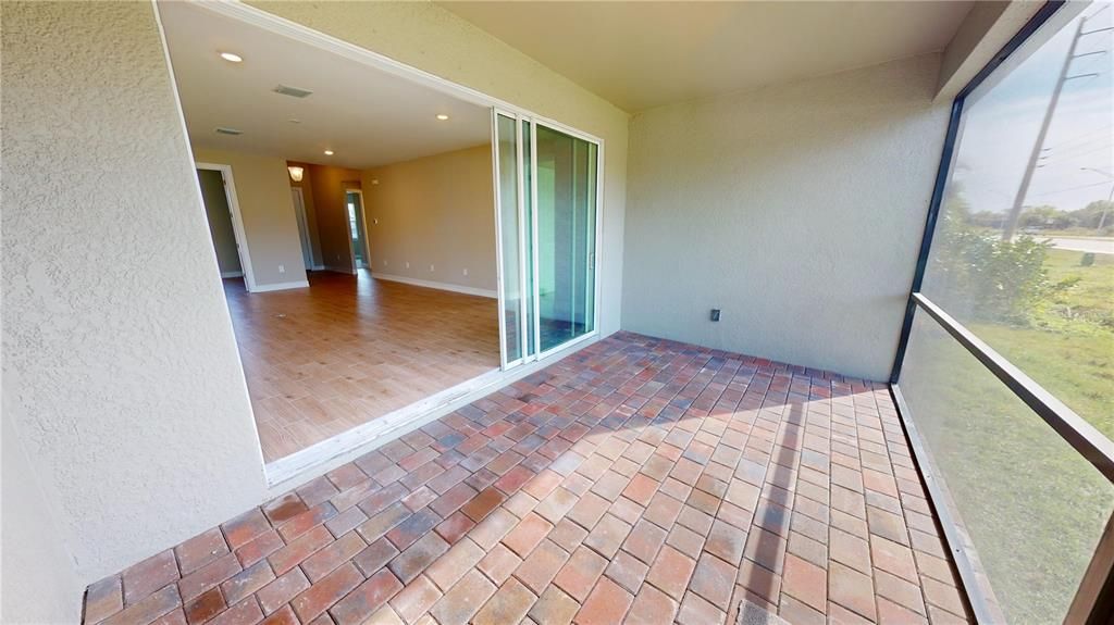 Screened rear lanai with bath access