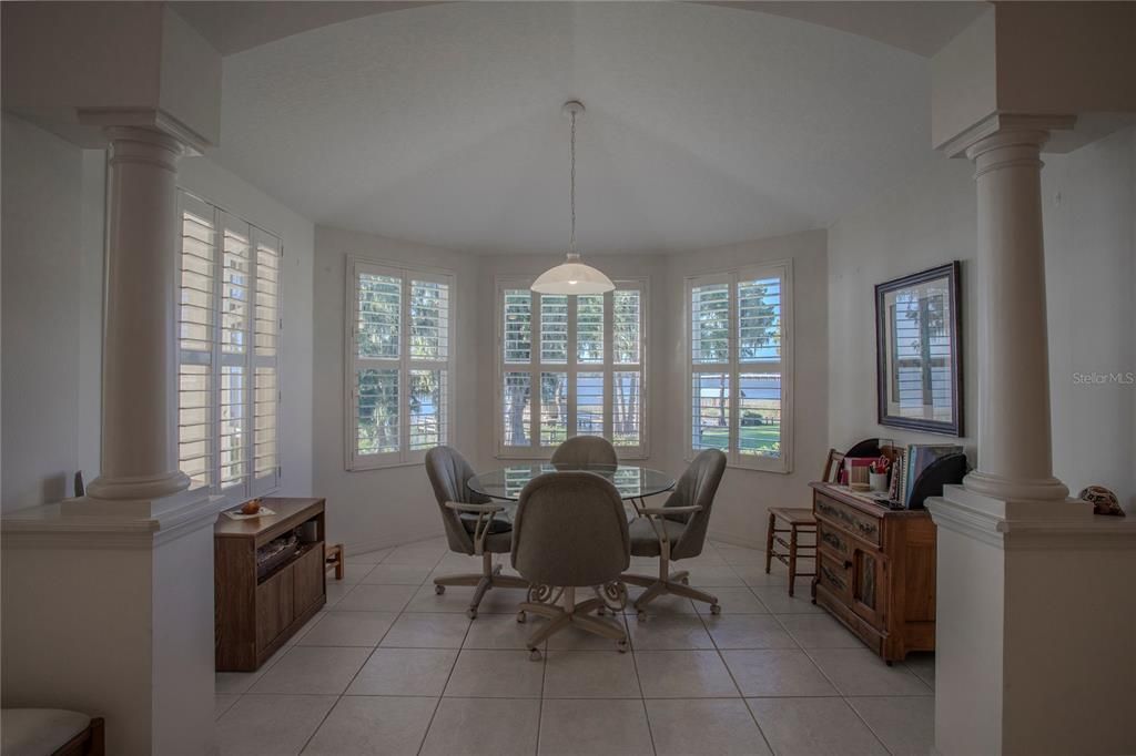 Wonderful Breakfast/Anytime Nook with Plantation Shutters and wonderful lake views.