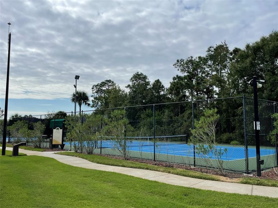 Tennis courts, just one of many other amenities.