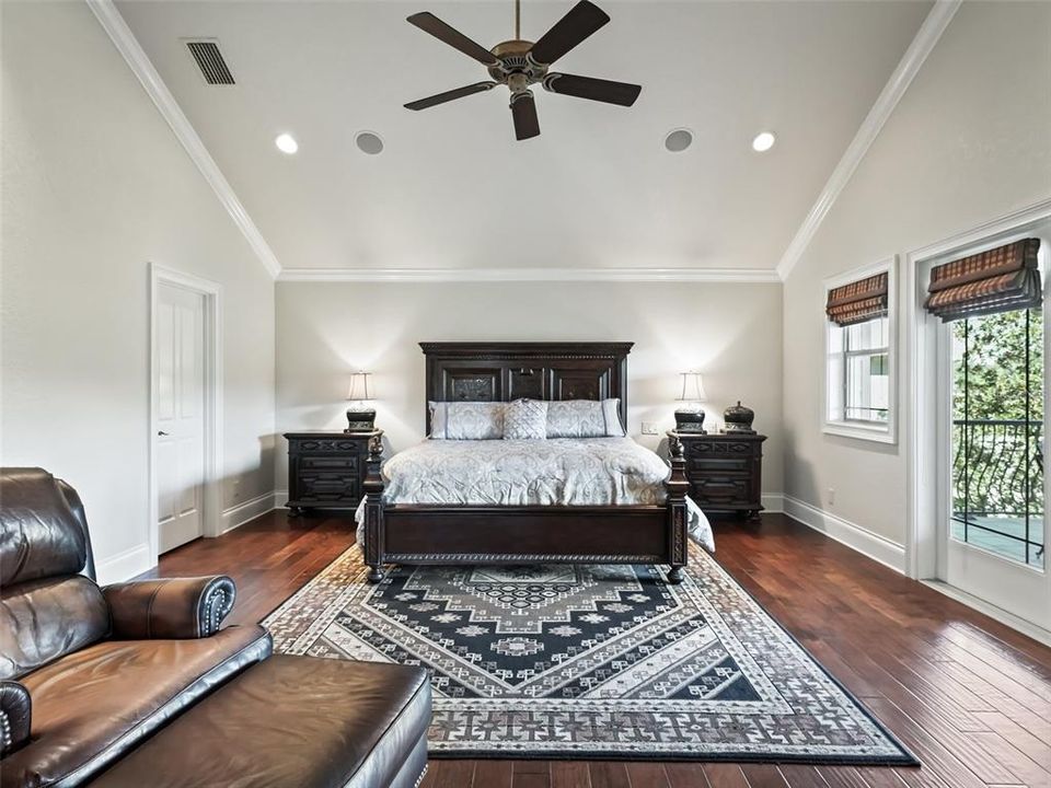 Primary Bedroom with Balcony views