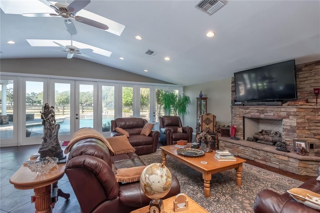 Game room with gas fireplace