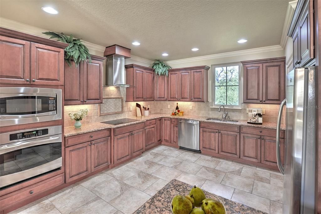 Granite counters and porcelain tile in the Kitchen.