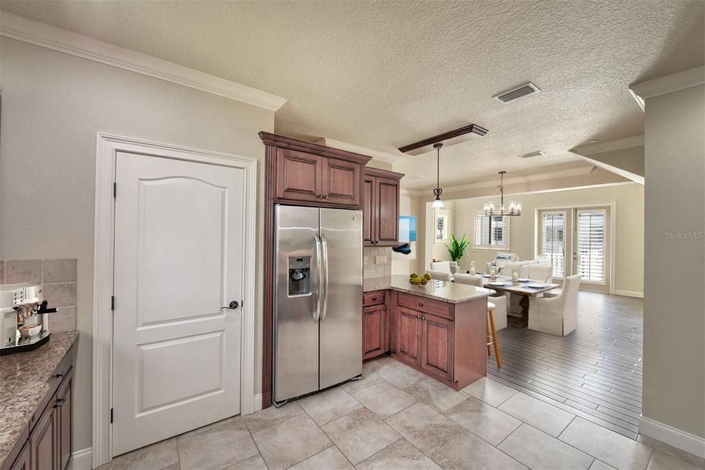 Breakfast bar. Kitchen is open to the dining and living rooms.