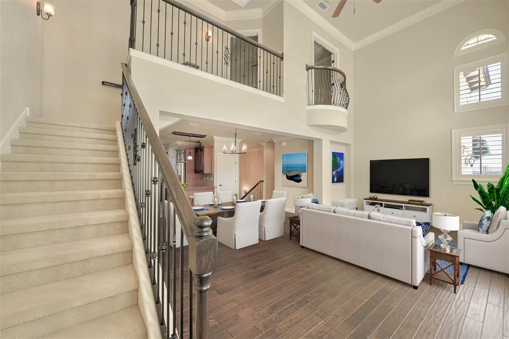 Living room offers plenty of room for a pool or game table.