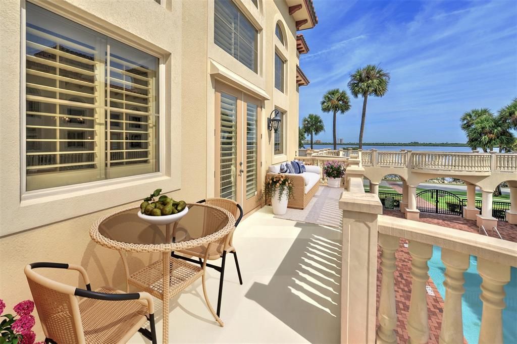Balcony off the Living room is ideal for entertaining and offers water views.