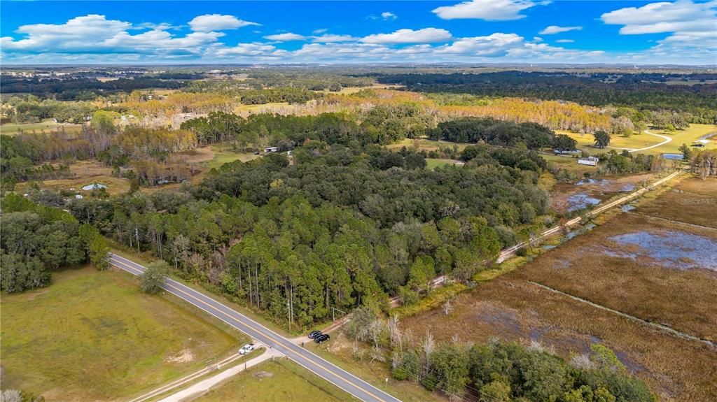 Aerial of 2610 Stephens Rd Groveland, FL 20acres and 5/2 home with HUGE outbuiding