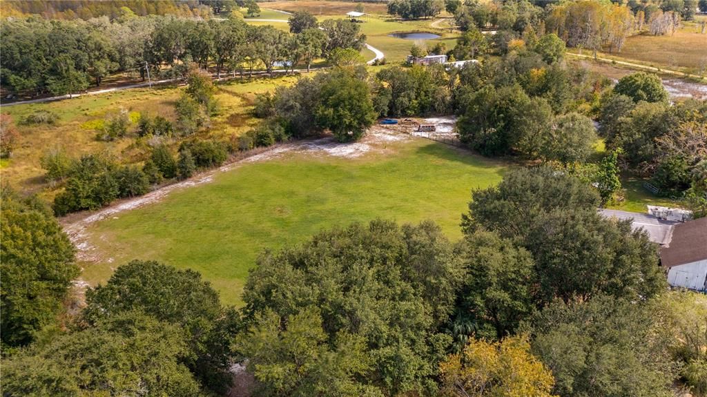 Aerial of 2610 Stephens Rd Groveland, FL 20acres and 5/2 home with HUGE outbuiding