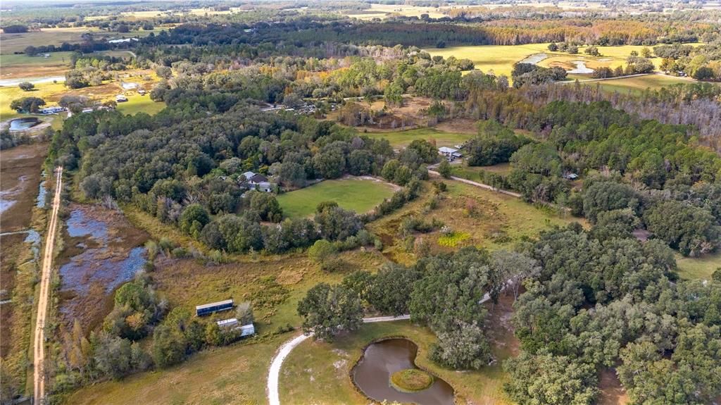 Aerial of 2610 Stephens Rd Groveland, FL 20acres and 5/2 home with HUGE outbuilding