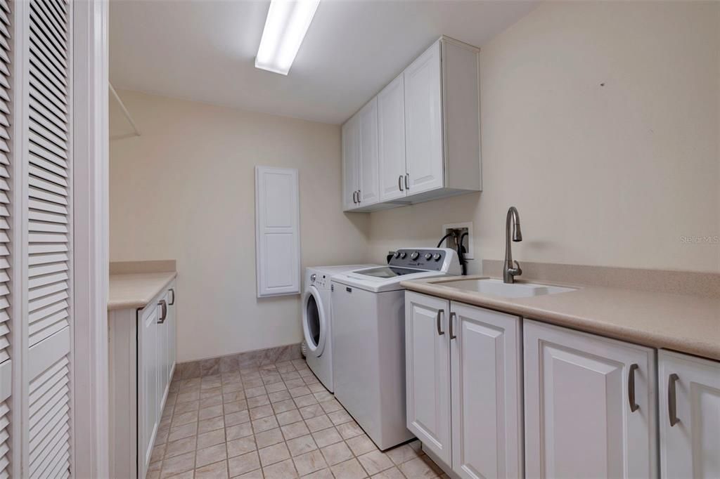 Laundry Room great size with tons of storage. Penthouse Floor 3