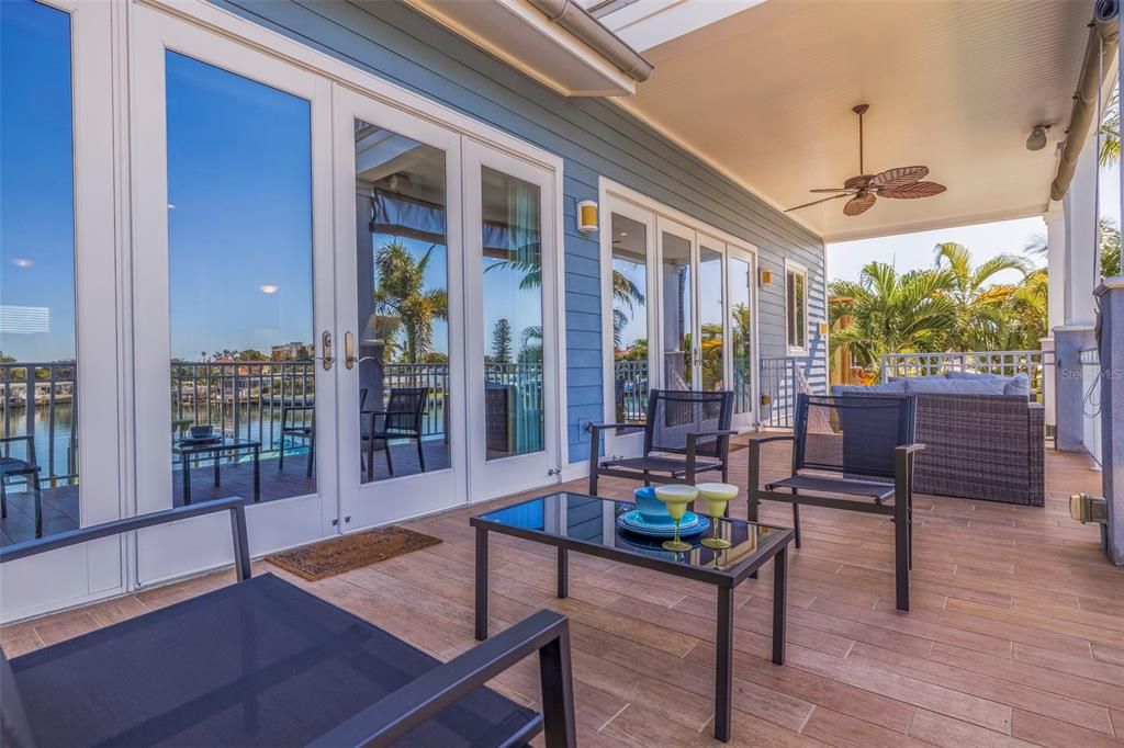 Main Level Outdoor Covered Porch and open Patio Combo, Best of Both with sunset water views! Floor 2 with exterior access to Ground Level Pool area, dock, etc.