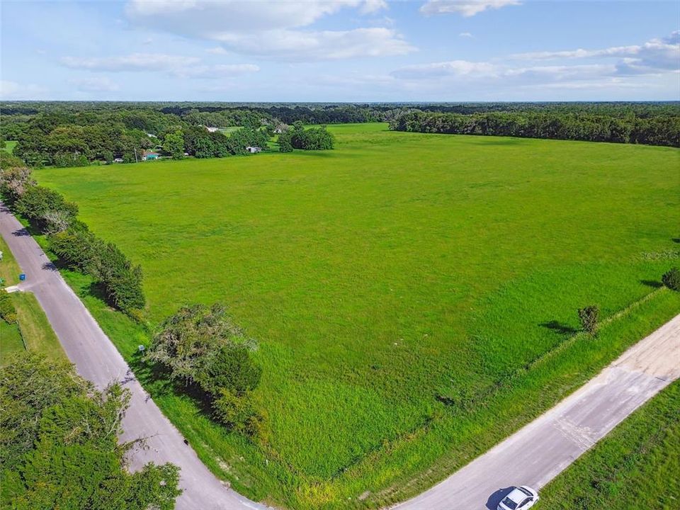 House is at upper left of picture - among trees