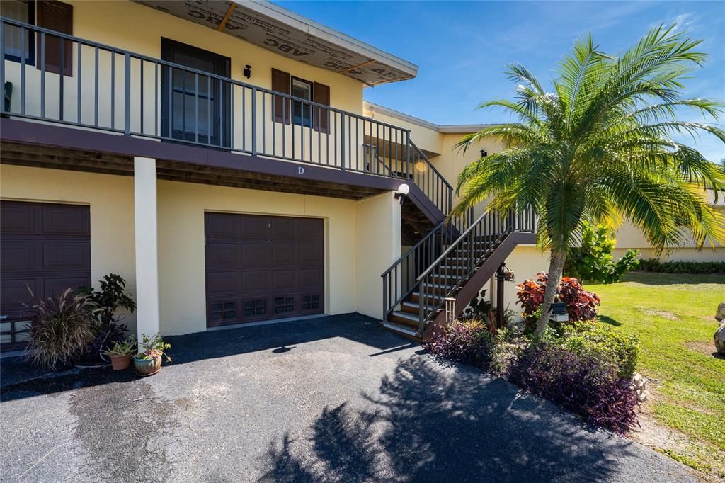 This end unit has a tandem 2 car parking garage.