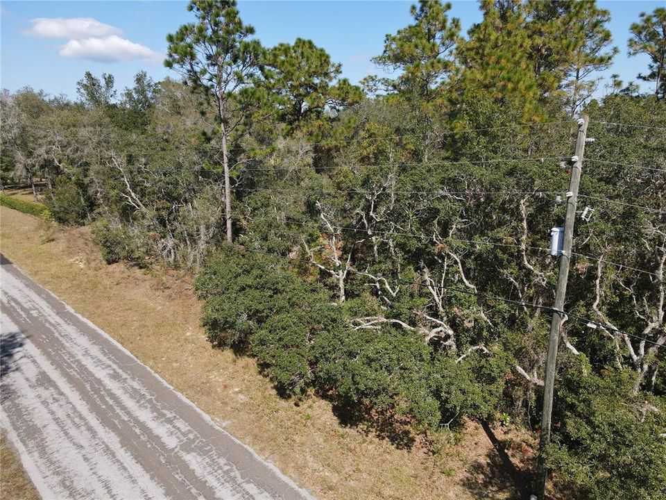 Aerial side view of the lot and the road.