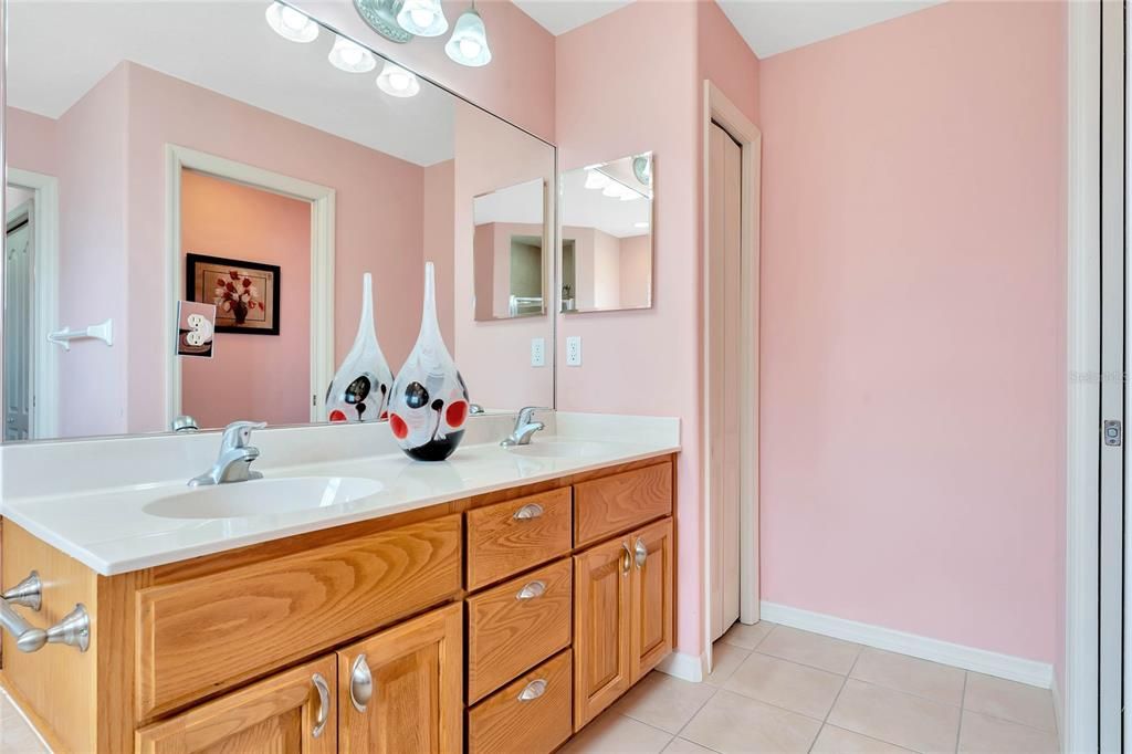 Dual sink vanity with linen closet