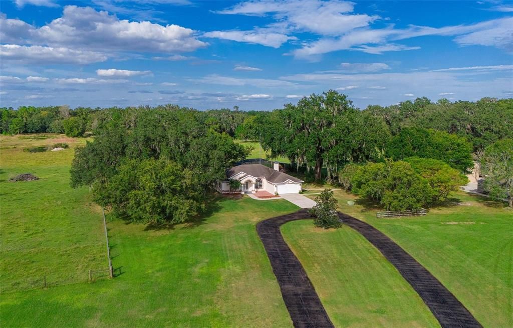 Long Circular Driveway leading up to you New Pool Home!