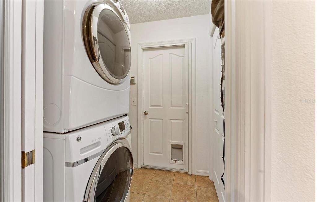 Laundry room between Garage and Kitchen. Has Pantry as well.
