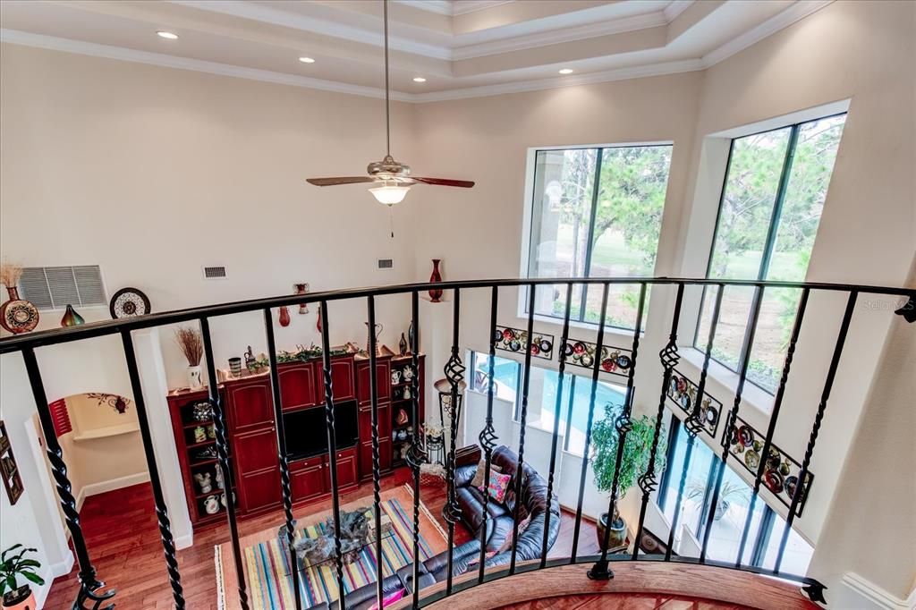 2nd Story Walkway overlooking Great room with built in entertainment center.