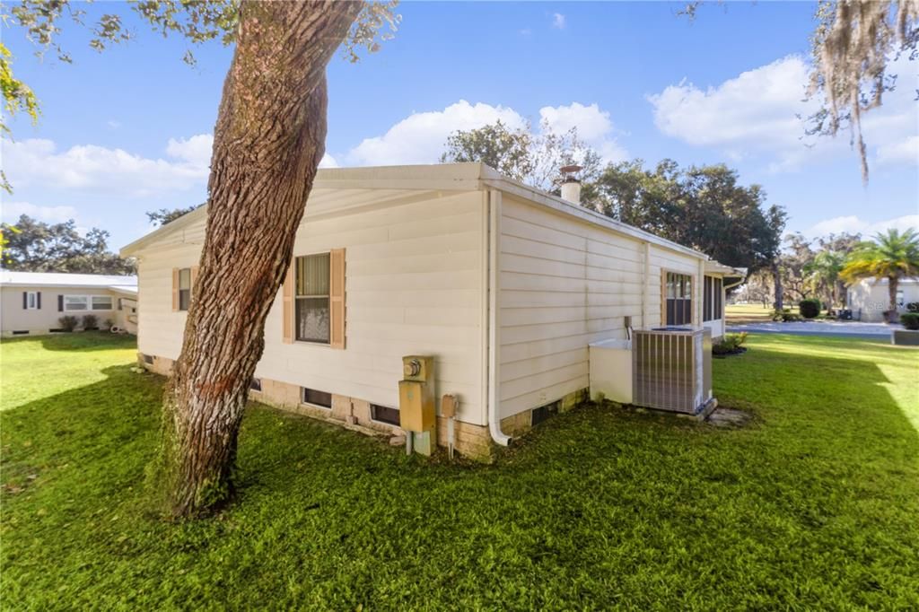 Rear View of Home/ Manicured Landscaping