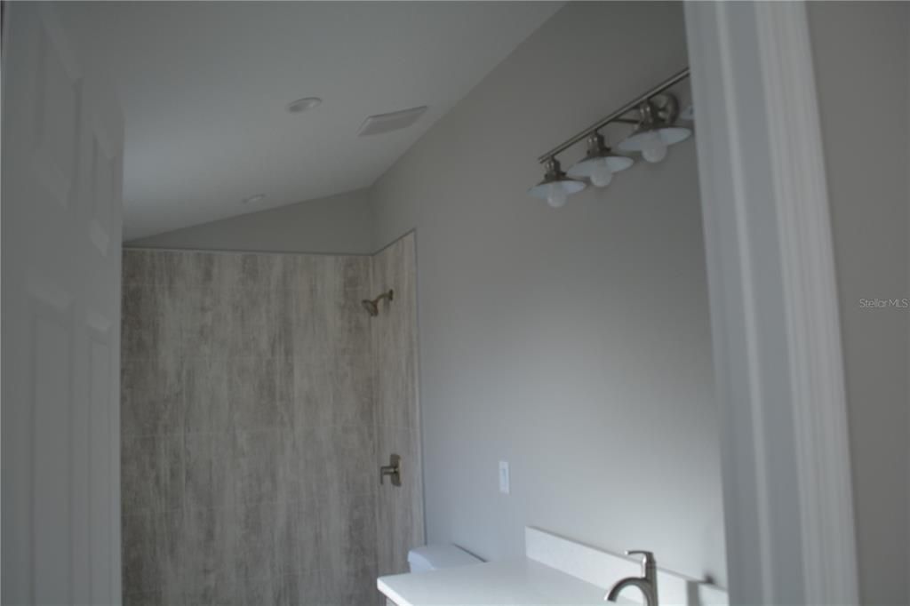 High ceilings in the bath with window for nice lighting