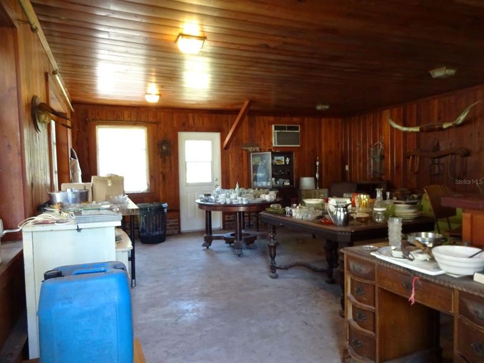 Barbecue room with Pecky Cypress and Pine walls.