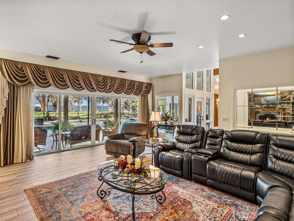 Family room overlooking pool and lake