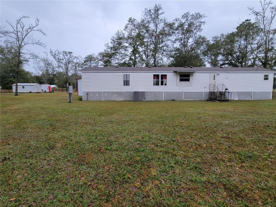 Back of mobile home facing west